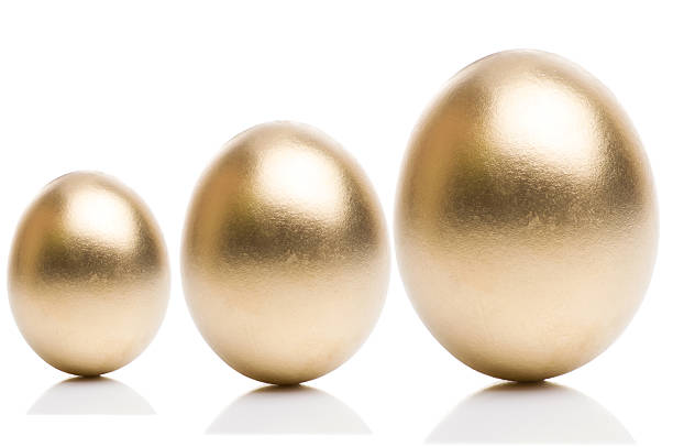 istock Golden eggs from  isolated on a white background. 507582454