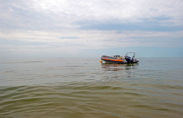 istock Motorboat floating at sea in summer 507582601