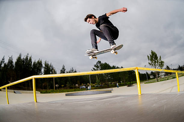 istock Skateboarder doing a ollie 507582718