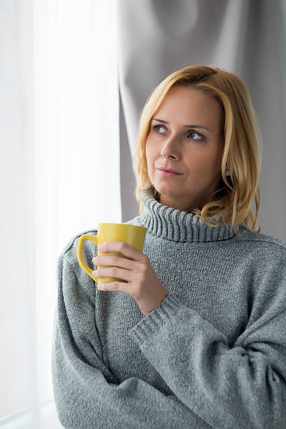 istock Woman with a cup of coffee 507582730
