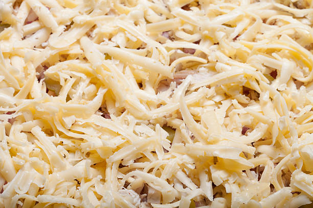 istock Unprepared pizza with grated cheese 507582738