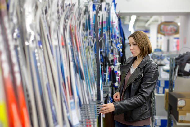 istock woman buys skis 507582900