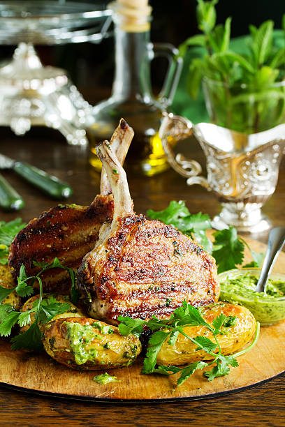 istock Grilled pork chop on the bone with spicy potatoes. 507582930