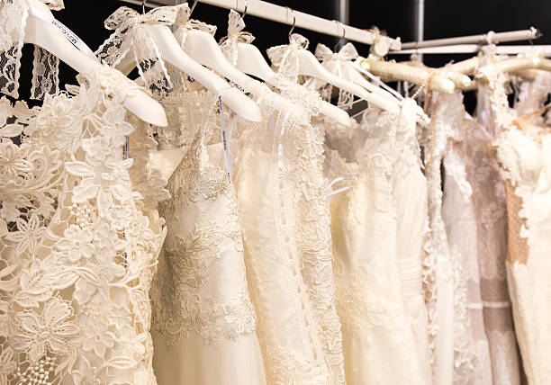 istock wedding dresses hanging on racks 507582966
