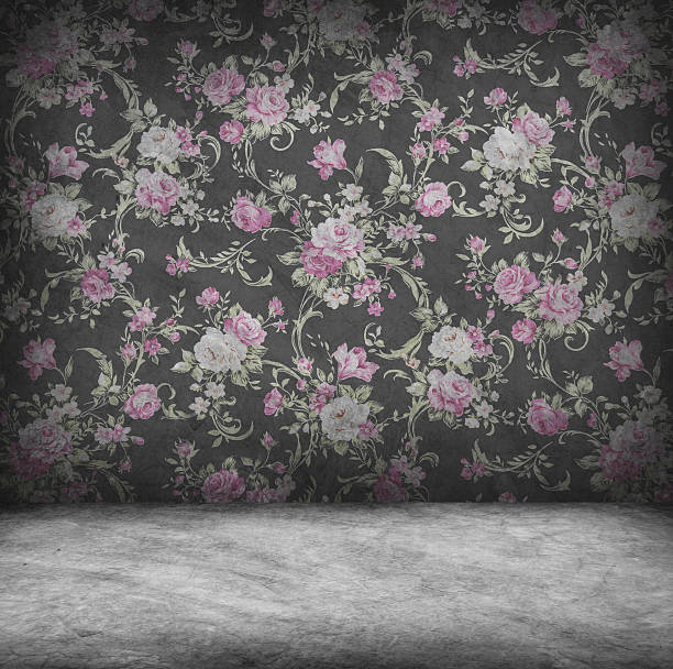 istock Concrete wall and floor texture with pink rose wallpaper , Grung 507583405