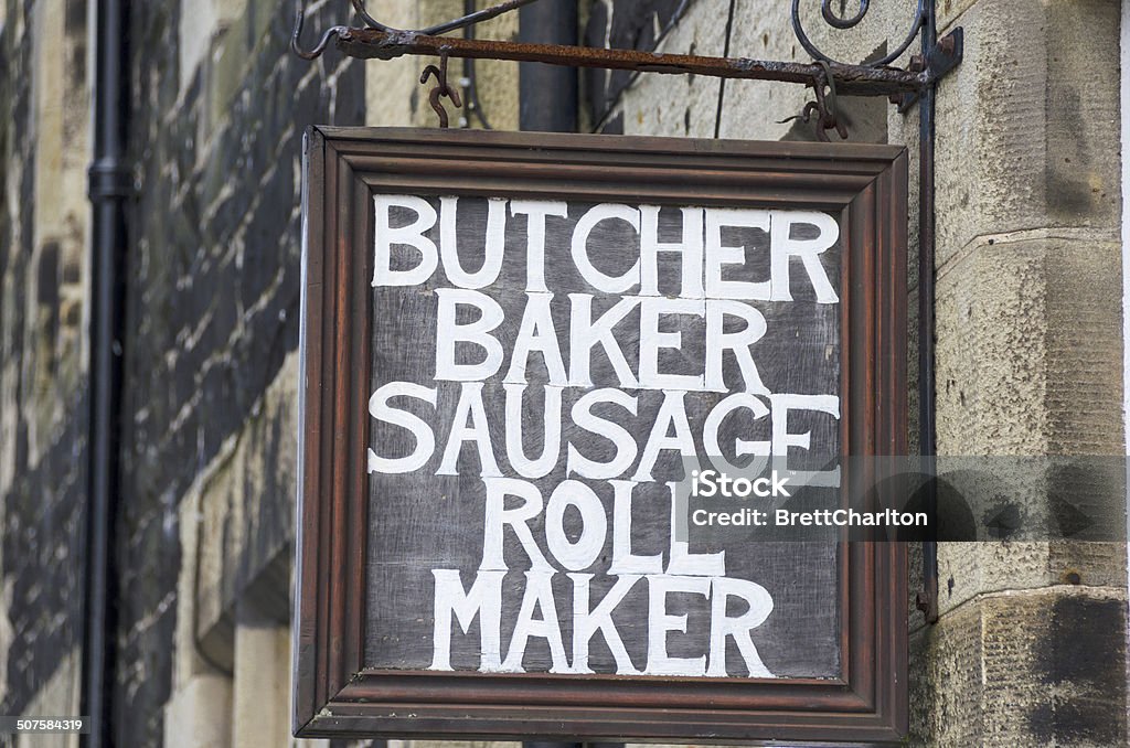 Shop Sign Amusing shop sign for a baker or butcher Baker - Occupation Stock Photo