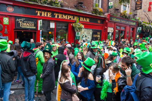 Dublin, Ireland - March 17, 2014: Saint Patrick's Day parade in Dublin Ireland on March 17, 2014: People dress up Saint Patrick's at The Temple Bar