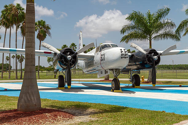 Bay of Pigs Monument I Miami, Florida, USA - August 10, 2013 :  Fighter Bomber, replica of the aircraft used in the Invasion of the Bay of Pigs. Wings Over Miami Museum. Monument in Memory of the Pilots of The Liberation Air force Brigade 2506.  bay of pigs invasion stock pictures, royalty-free photos & images