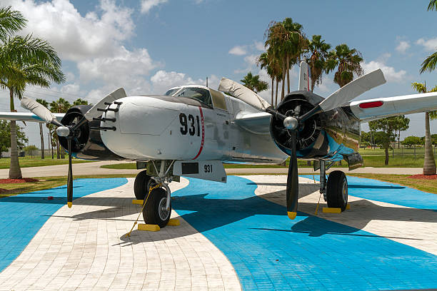 Bay of Pigs Monument II Miami, Florida, USA - August 10, 2013 :  Fighter Bomber, replica of the aircraft used in the Invasion of the Bay of Pigs. Wings Over Miami Museum. Monument in Memory of the Pilots of The Liberation Air force Brigade 2506.  bay of pigs invasion stock pictures, royalty-free photos & images