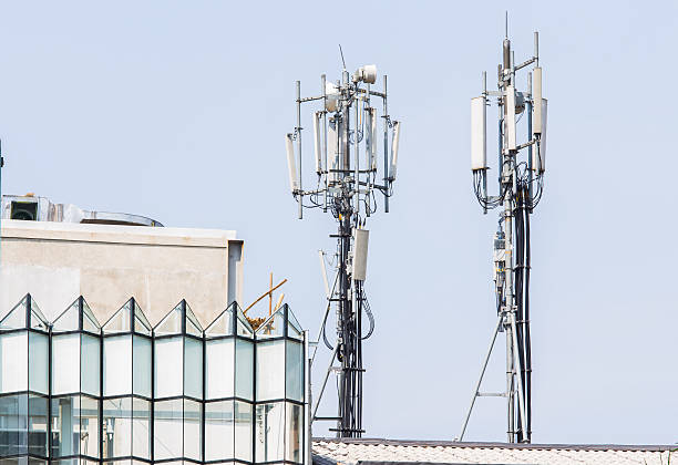 istock Double Telecommunication towers on the building 507617975