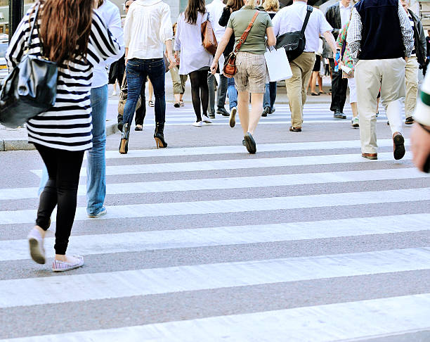 istock People crossing street 507619785
