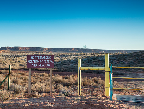 Page, USA - January 26, 2016: An editorial stock photograph of a no trespassing sign on Native American Tribal land in Page, Arizona. Violation of Federal and Tribal Law.