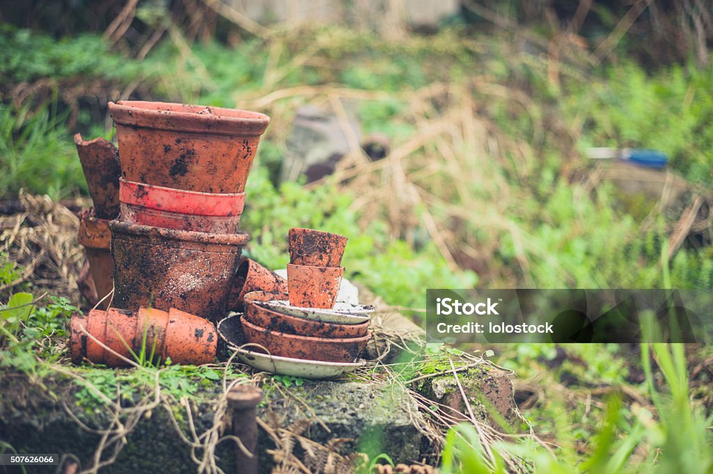 Stack of pot planters in garden A stack of pot planters in a garden Autumn Stock Photo
