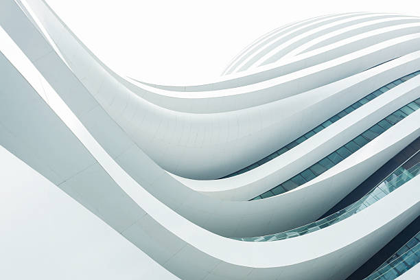 Galaxy Soho, Beijing Beijing, China - August 22, 2014: Curved buildings at the Galaxy Soho, a complex with office buildings, shopping mall, stores and restaurants. Galaxy Soho was designed by Zaha Hadid architects and opened in 2012. white buildings stock pictures, royalty-free photos & images