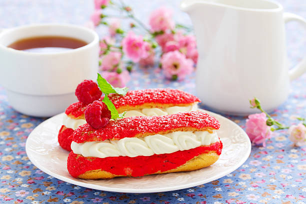 Eclair with strawberries and cream shibust.Eclair with strawberries and cream shibust.