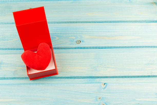 istock red heart on a blue wooden background. Valentine's day 507628406