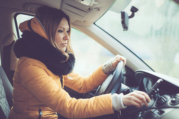 istock Young woman sets the destination on the gps 507629726