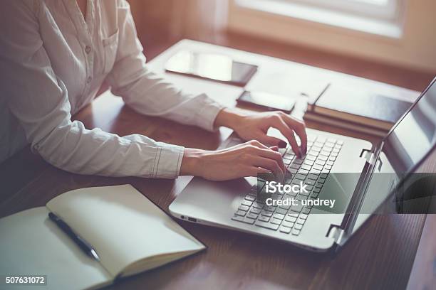 Woman Working In Home Office Hand On Keyboard Close Up Stock Photo - Download Image Now
