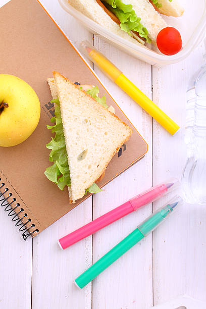 istock sandwich with sausage and lettuce on a table 507631632