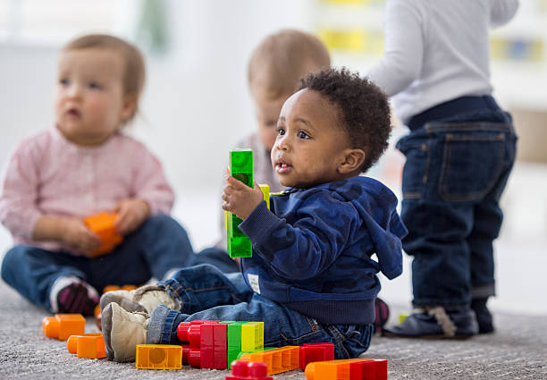 istock Babies playing together in preschool. 507632130