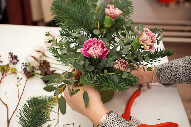 istock Creating a wonderful composition cotton, cones, fir, magical variety carnations 507634410