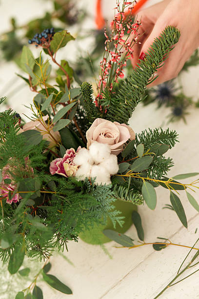 istock Creating a wonderful composition cotton, cones, fir, magical variety carnations 507635028