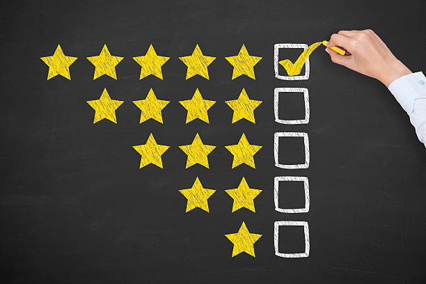 Rating Five Golden Stars on Blackboard Rating Five Golden Stars on Blackboard luxury hotel stock pictures, royalty-free photos & images