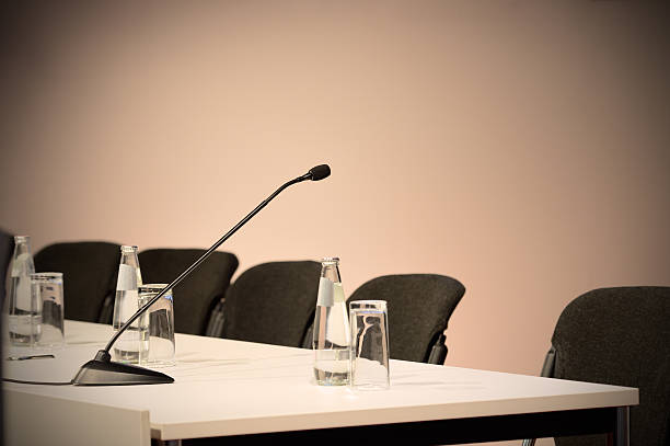 istock Microphone ready on stand, all set for conference to begin 507636550