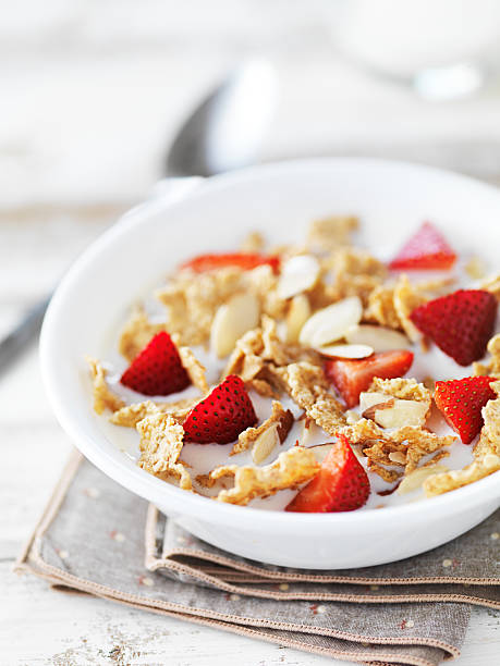 istock bowl of cereal with strawberries and almonds 507639392