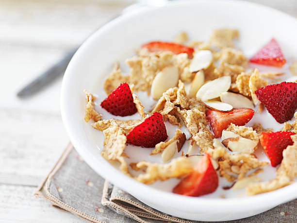 istock bowl of cereal with strawberries and almonds 507639428
