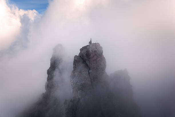 istock Mountain landscape. High rocks in fog at sunset 507639580