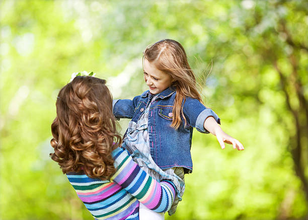 istock Mother and daughter in park 507649897