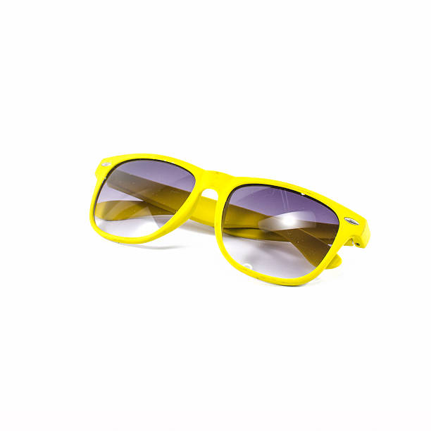 istock yellow sunglasses isolated on white 507651589