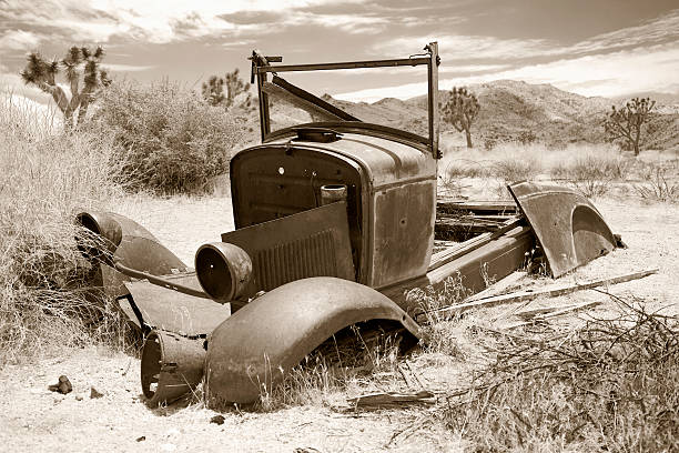 istock Aged image of an abandoned auto in the desert 507651839