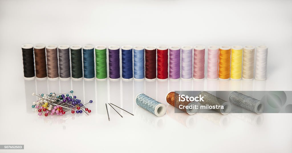 Threads with needles A lot of Threads with needles and pins Art And Craft Stock Photo