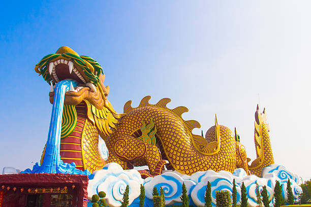 istock Giant golden Chinese dragon with blue sky background 507652901
