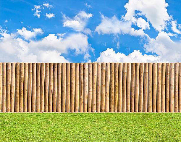 istock half round post and rail fence with skie 507654677