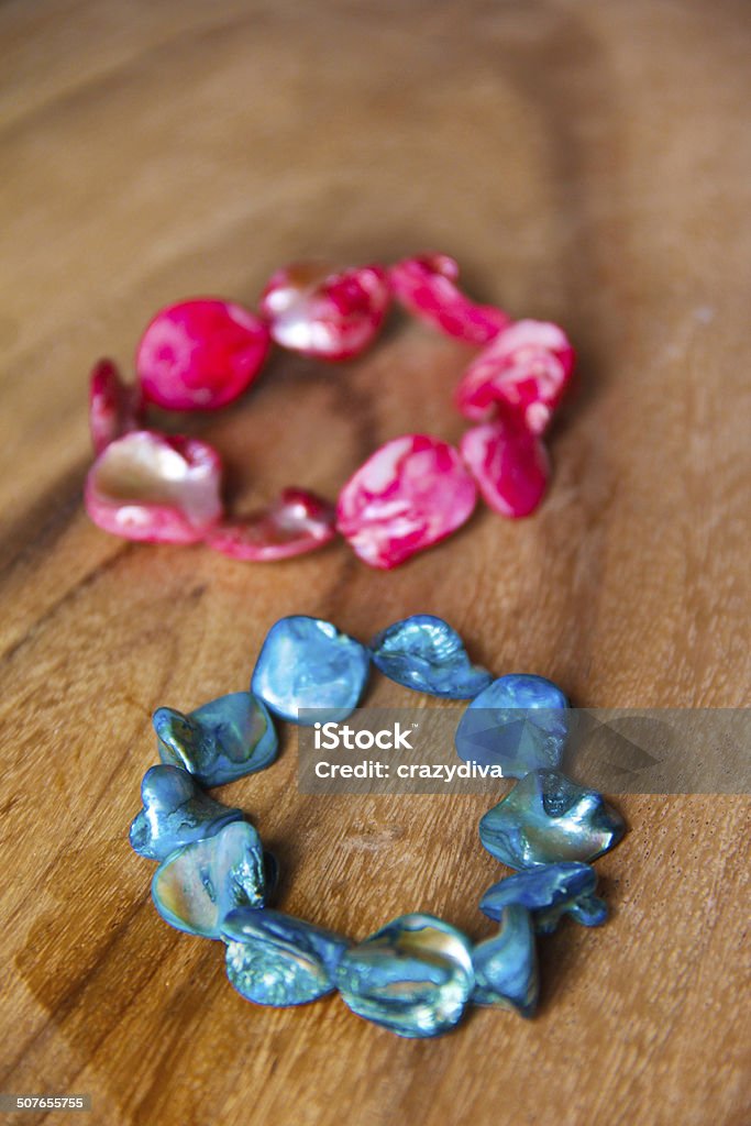 Heap of bead bracelet Heap of bead necklace, on wooden Background Asia Stock Photo