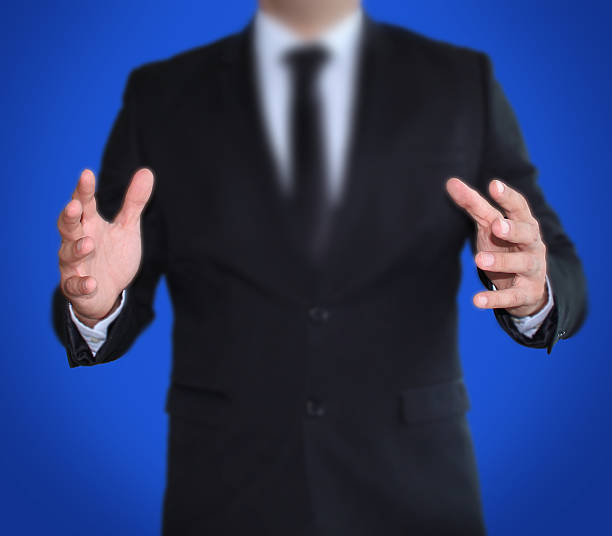 istock Businessman and Two Outstretched Hands 507656417