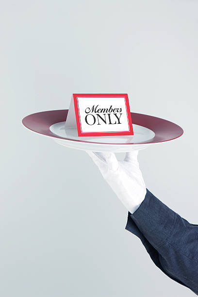 istock Members Only Card On Platter Held By Waiter 507657161