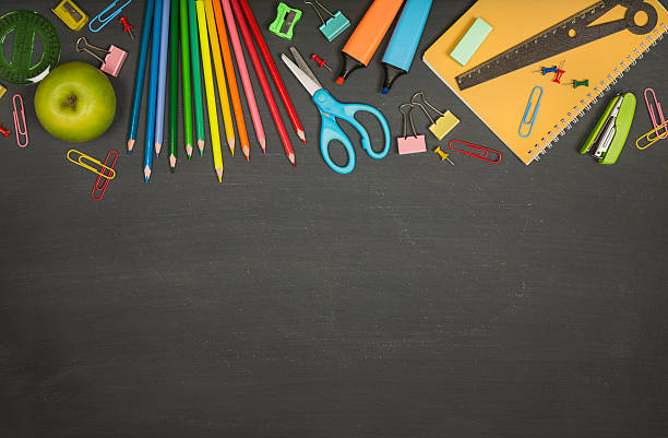 istock School supplies on a blackboard with copy space 507676000