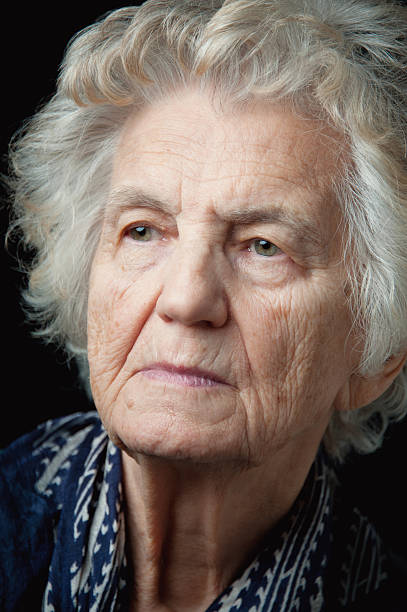 istock Senior Woman Serious Look 507677400