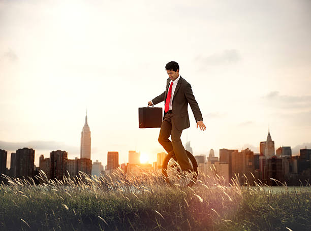 istock Businessman Commuting Ecology Saving Sunrise Concept 507678140