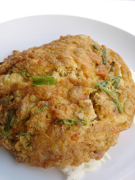 istock Pork omelet with Vegetable  & Thai jasmine rice 507680670