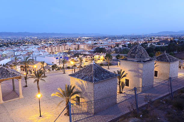 Old town of Lorca, Spain View over the old town of Lorca at dusk. Province of Murcia, Spain lorca stock pictures, royalty-free photos & images