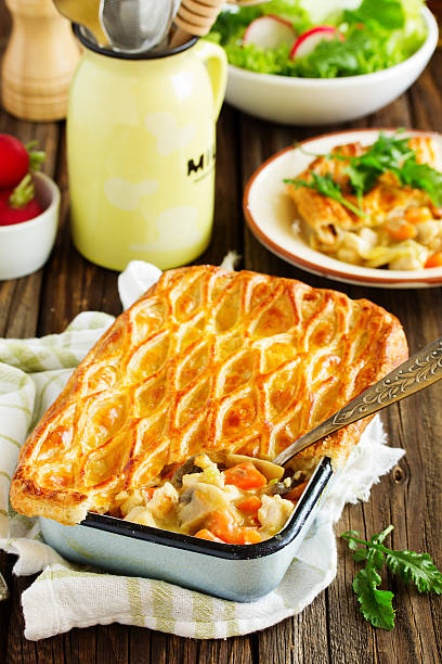 istock American chicken pie with vegetables in puff pastry. 507682662