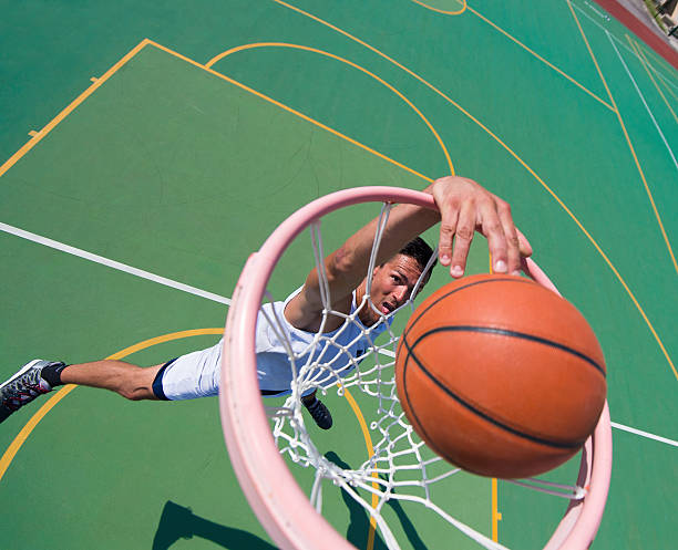 istock Young Male Basketball Player Making a Basket 507682745