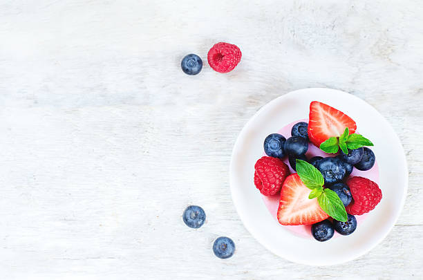 istock souffle cake with fresh raspberries, blueberries and strawberries 507682977