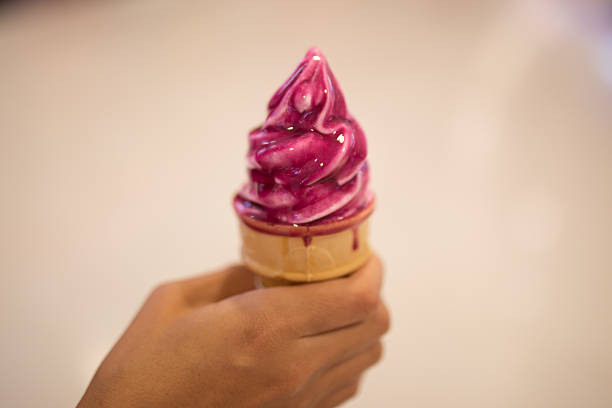 istock Ice cream in woman hand outdoors. Selective focus. 507683036