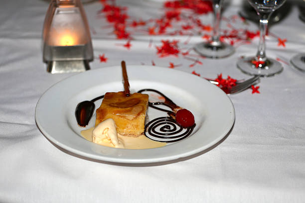 istock cake on the plate with chocolate and ice cream 507683423